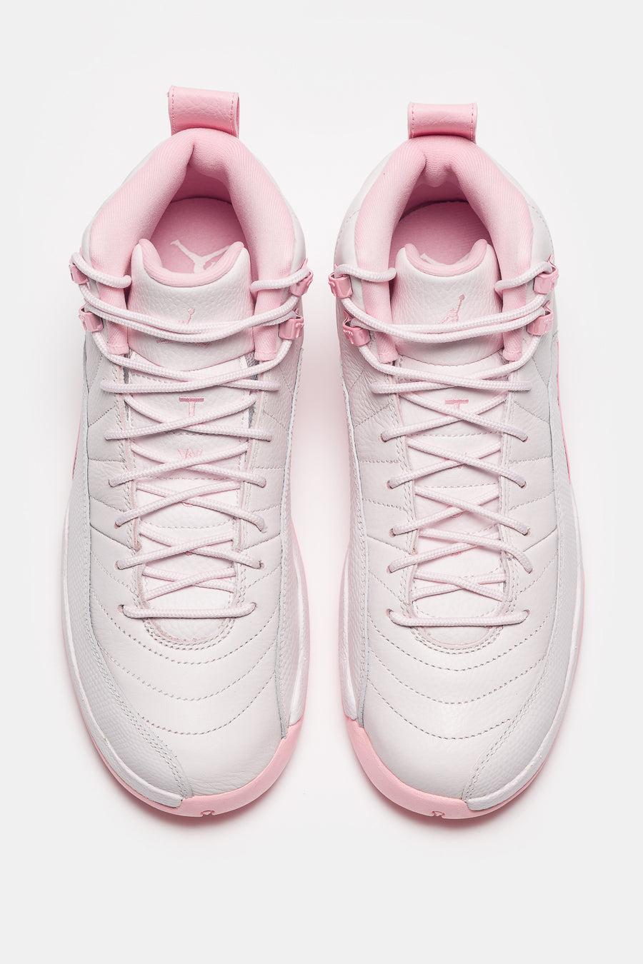 Jordan Air Jordan 12 Retro Big Kids Sneaker in Pearl Pink/Medium Soft Pink - Notre