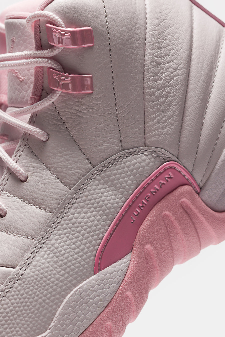 Jordan Air Jordan 12 Retro Big Kids Sneaker in Pearl Pink/Medium Soft Pink - Notre