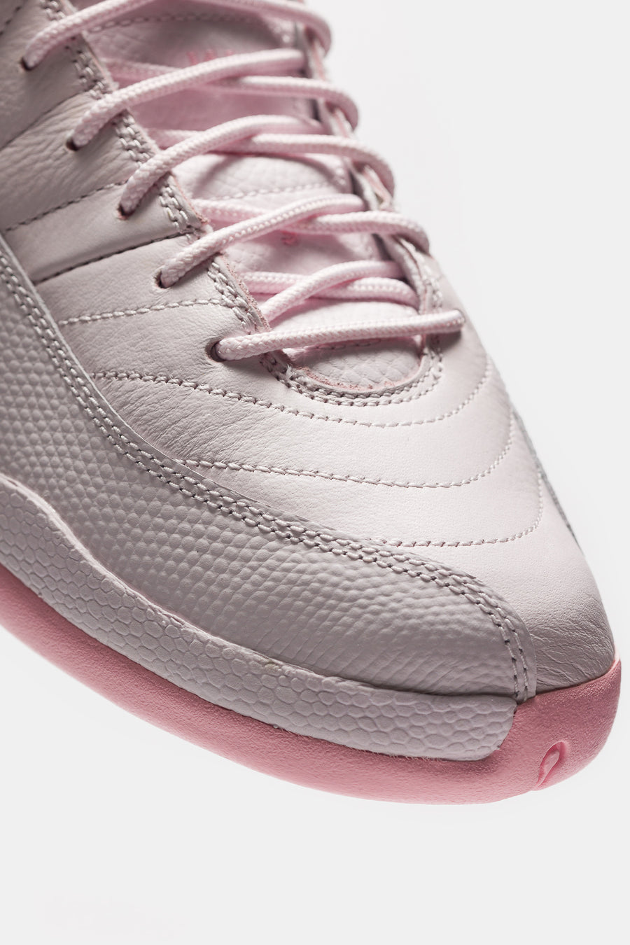 Jordan Air Jordan 12 Retro Big Kids Sneaker in Pearl Pink/Medium Soft Pink - Notre